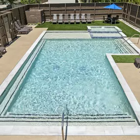 Second pool with sundeck and lounge chairs at Camden Belmont apartments in Dallas, TX