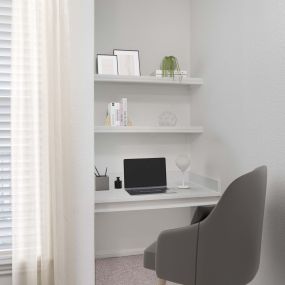 Camden Grand Harbor Apartments in Katy, TX with built-in desks and shelving