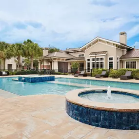 Resort style pool with water feature