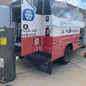 Champion AC & Plumbing work truck
