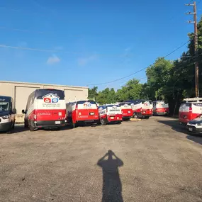 Champion AC & Plumbing work vans