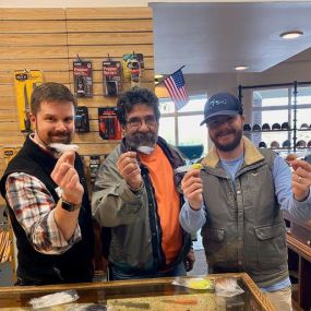 Wes, John, & Dave show off the newest delivery of saltwater flies at Jesse Brown’s from Ocean Flies USA.