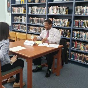 Volunteering at the Galena Park high school for mock interviews