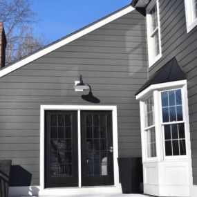 We suggest paying a bit more to gain the durability and longevity of Fiber Cement Siding.