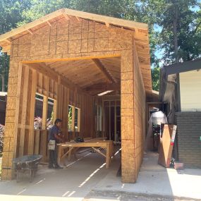 Garage room addition with laundry room and storage room as extra functional space