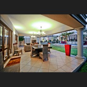 Sandy Springs patio remodel with tile floors, ceiling and downlights