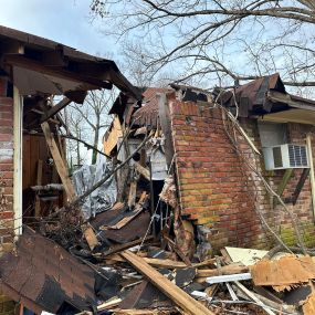 Wind damage beyond repair - the house required full demolition for restoration.