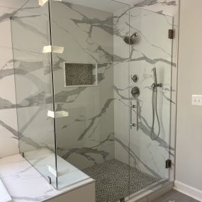 We pride ourselves in bathroom remodels, and work closely with vendor Home Glass for reasonably priced, striking shower cubicle glass.