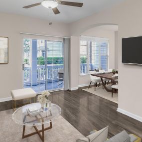 Living, dining room, and kitchen with balcony at Camden Governors Village Apartments in Chapel Hill, NC