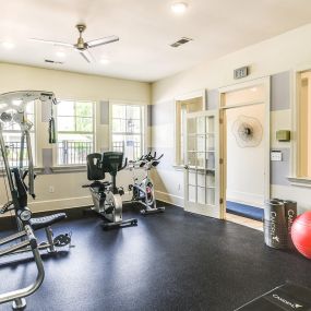 Fitness center with strength training equipment at Camden Governors Village Apartments in Chapel Hill, NC