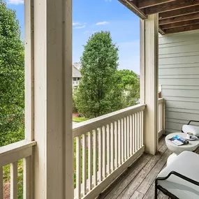 Balcony overlooking community landscaping at Camden Governors Village Apartments in Chapel Hill, NC