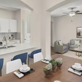 Dining room and kitchen with arched entryway into living room at Camden Governors Village Apartments in Chapel Hill, NC