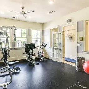 Fitness center with strength training equipment at Camden Governors Village Apartments in Chapel Hill, NC