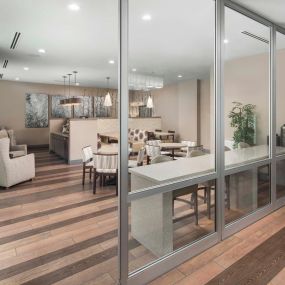 Resident clubroom with glass room divider walls at Camden Lamar Heights