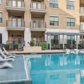 Resort style pool with tanning ledges at Camden Lamar Heights