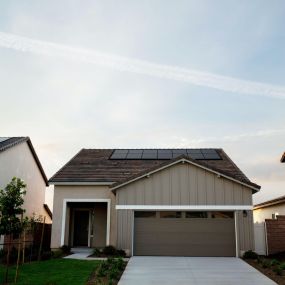 Residential home with brown garage door