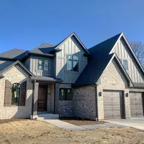 large home with new garage doors