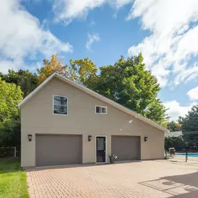 Residential garage door and home