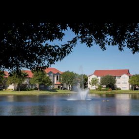 Relaxing views of lake with water feature