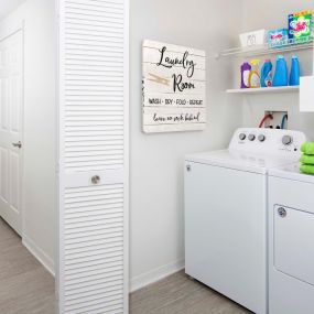 Laundry room with full size washer and dryer