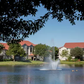 Relaxing views of lake with water feature