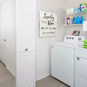 Laundry room with full size washer and dryer