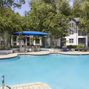 Gourmet grilling area at the pool at Camden Phipps in Atlanta, GA