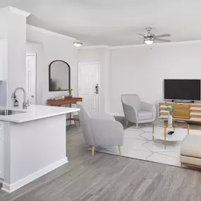 Modern style living room with ceiling fan at Camden Phipps apartments in Atlanta, GA