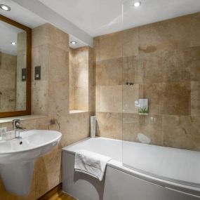 Bathroom at Woodford Bridge Country Club by Diamond Resorts