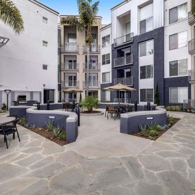 camden main and jamboree apartments irvine ca outdoor barbecue grilling courtyard