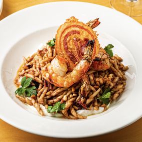 Fall 2022 Grilled Shrimp and Trofie Pasta  with Radicchio pesto, pancetta, red wine braised onions, whipped ricotta, toasted pine nuts