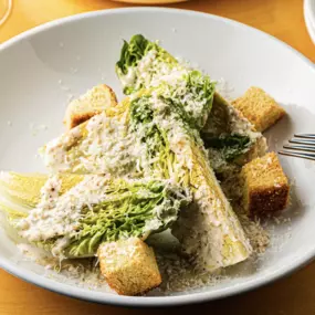 Jax Caesar Salad with little gems, croutons, whole grain mustard dressing, grana padano