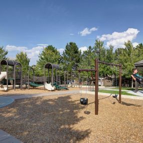 Metro denver playground with swings and pavilion
