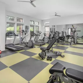 Fitness center with cardio and strength training equipment