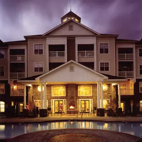 Clubhouse at night with outdoor fireplace