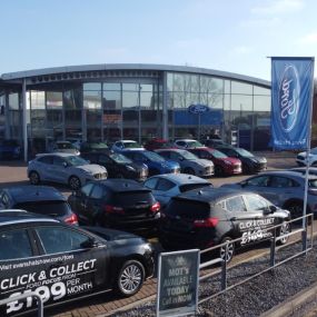 Outside the front of the Ford Bury dealership