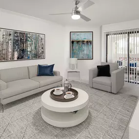 Spacious living room with ceiling fan and patio