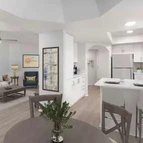 Open-concept dining area near kitchen with white quartz countertops