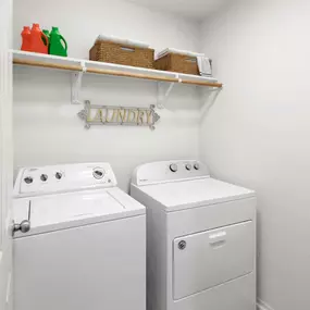 Full size washer and dryer in laundry room