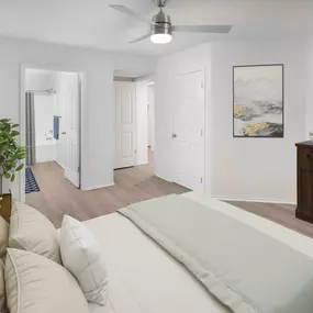 Main bedroom with ceiling fan and ensuite bathroom