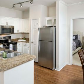 Kitchen with stainless steel appliances and large pantry