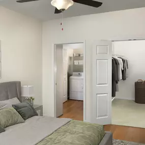 Spacious bedroom with walk-in closet and full-size washer and dryer at Camden Lago Vista in Orlando, FL