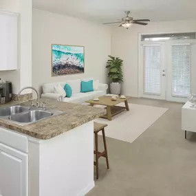 Open kitchen and living area with French doors to your balcony.