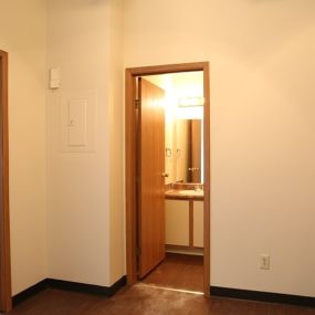 Bedroom With Ceiling Fan And Separate Bathroom