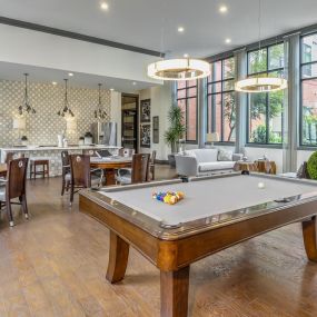 Resident lounge billiard and seating at Camden Gallery Apartments in Charlotte, NC