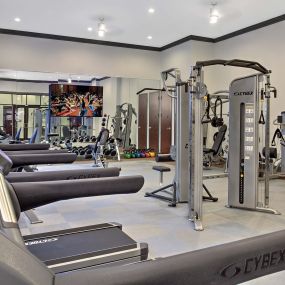 Fitness center with cardio equipment at Camden Gallery Apartments in Charlotte, NC