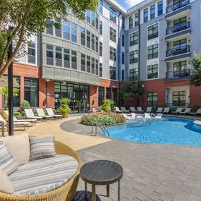 Lounge seating next to saltwater pool at Camden Gallery in Charlotte NC