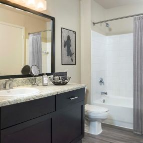 Bathroom with large tub and counter space