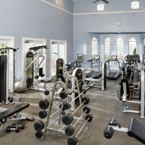 Fitness Center with Cardio and Strength Training Equipment.