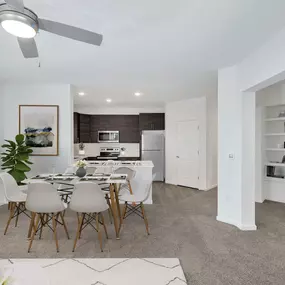 Contemporary style open concept kitchen and dining room with carpet at Camden College Park in College Park, Maryland